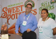 Steven Ceccarelli and Diana Ramirez with Farm Fresh Produce talk to show attendees about sweet potatoes.